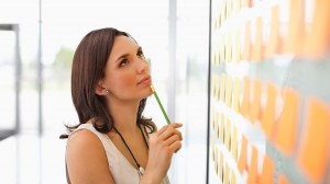 Woman with pencil planning schedule