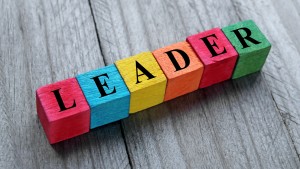 Leader word on colorful wooden cubes