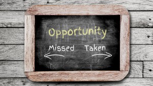 Opportunity Missed and Taken written on the blackboard