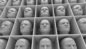 Many of the same people's heads in boxes