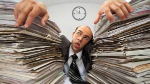 Exhausted businessman with too much work