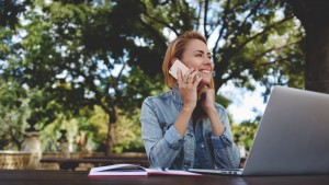 Young woman talking on smartphone