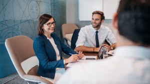 Business people working in office boardroom