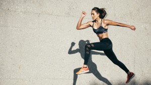 Young woman jumping running