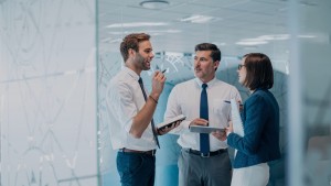 Group of business people talking in office
