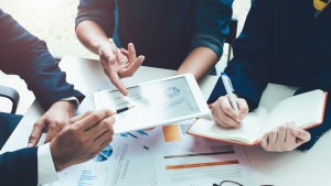 Business meeting analyze financial report